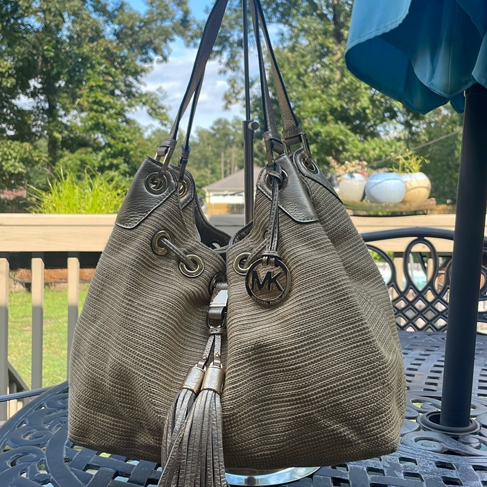 Michael Kors. Woven and gold bucket bag.